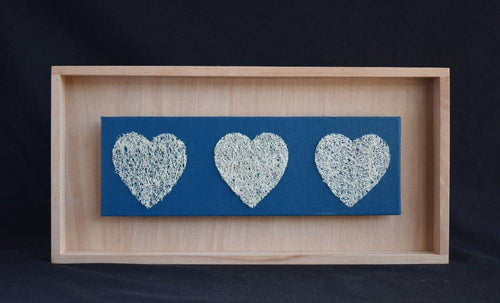 Loofah Hearts in Floating frame on blue canvas