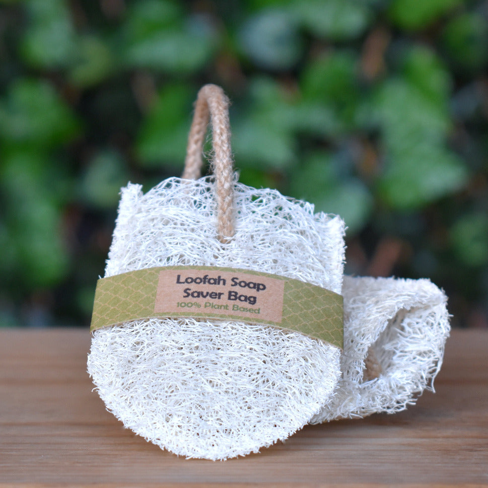 Loofah soap saver bag with green background | The Loofah Patch